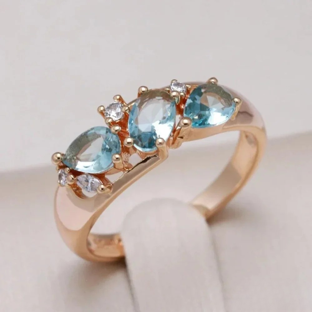 Kira | Gold ring with blue zirconia